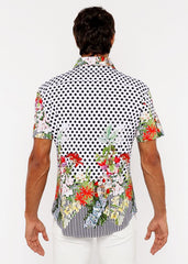 A vibrant short-sleeved dots abstract s s woven modal border shirt with black white polka dots and colorful floral prints