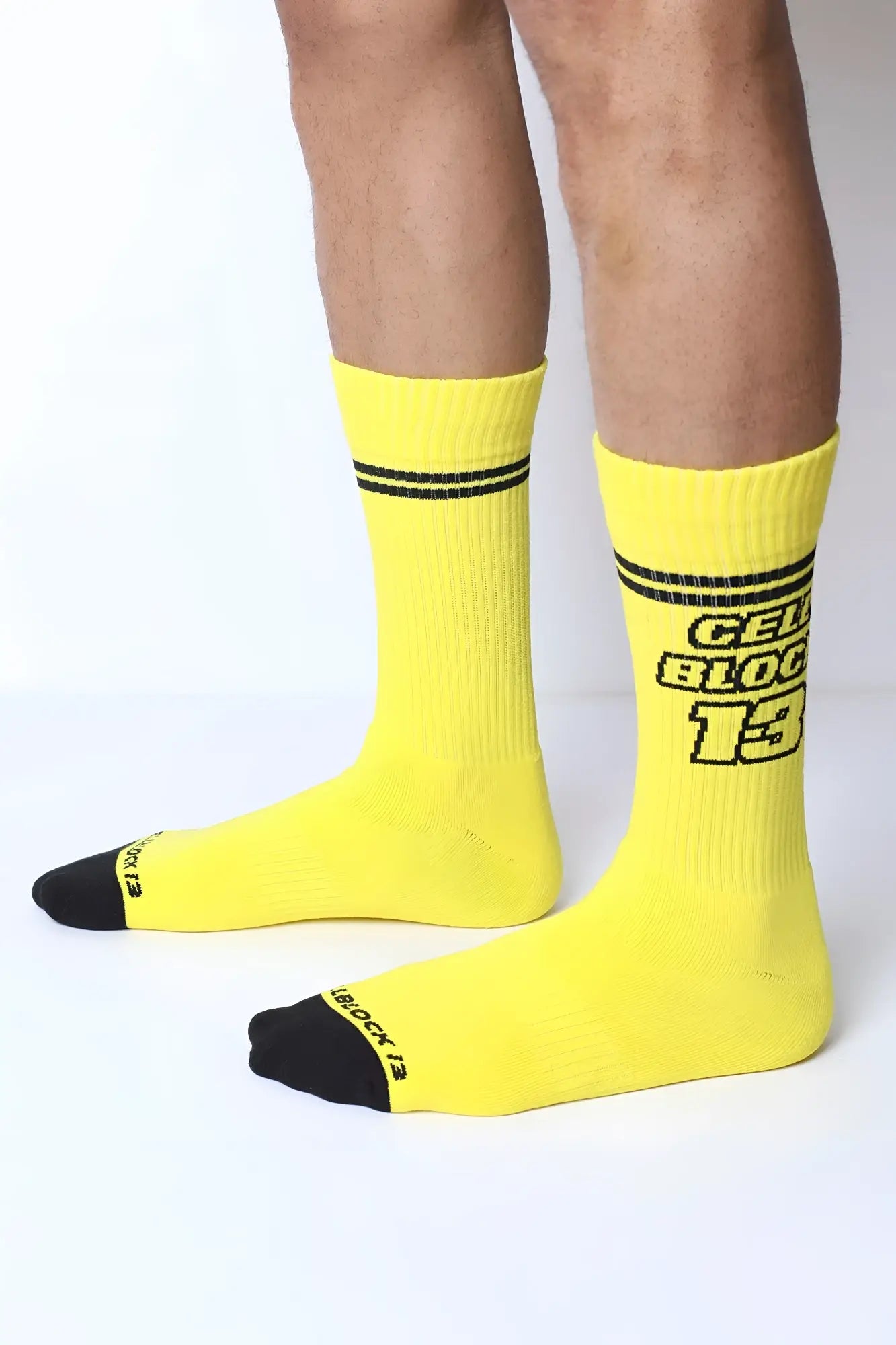 Starter crew socks bright yellow with black toe caps and stripes featuring gelb block 13 text on the side