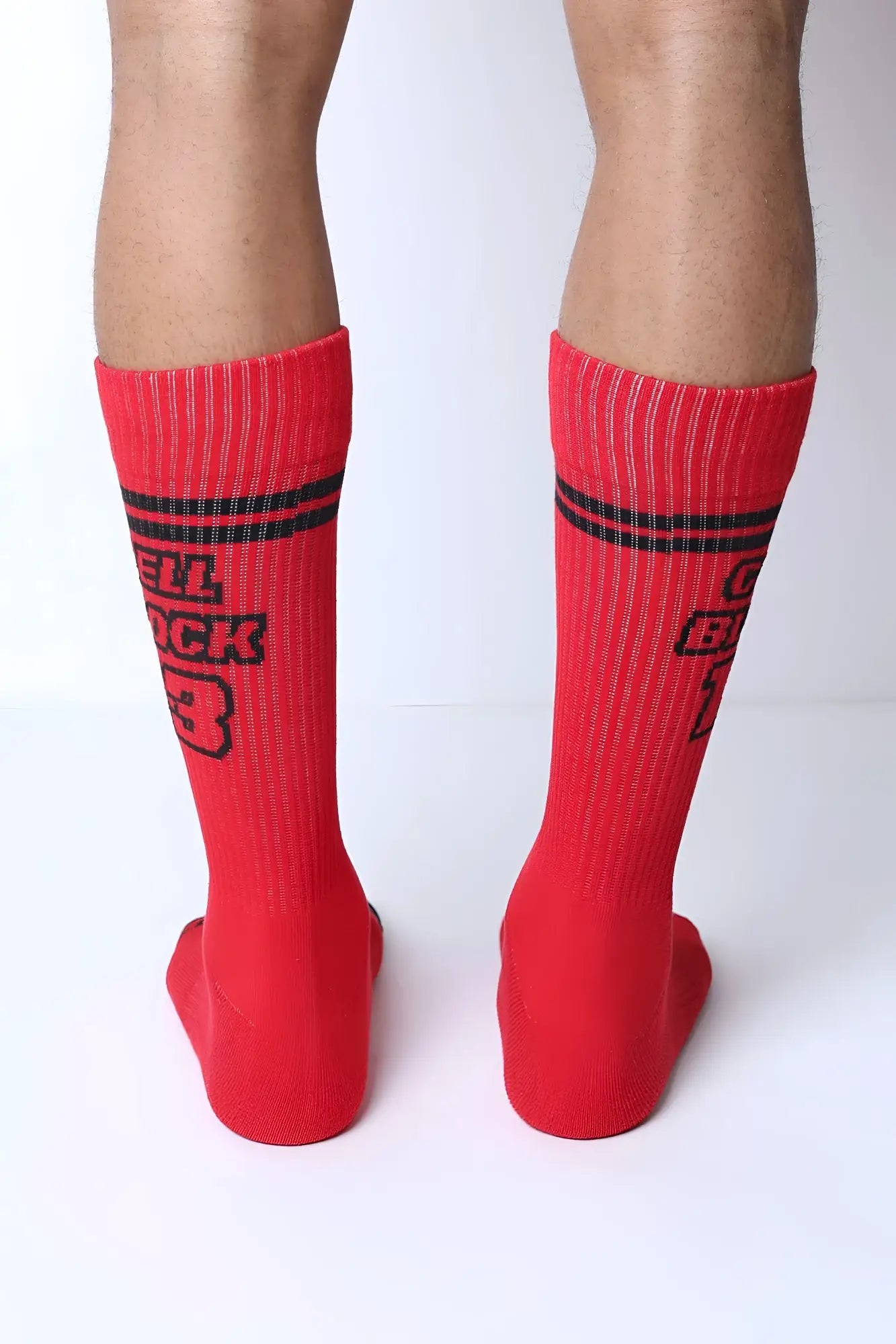 Starter crew socks in red with black horizontal stripes and bold block style hell buck 3 text