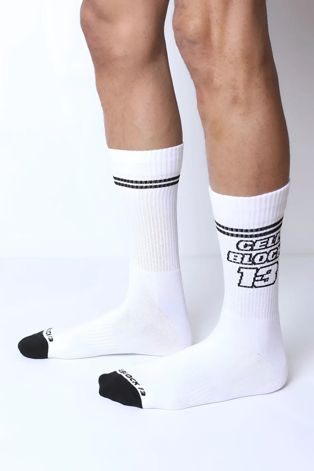 Starter crew socks white athletic socks with black toe caps stripes and bold cell block 13 graphic in black letters