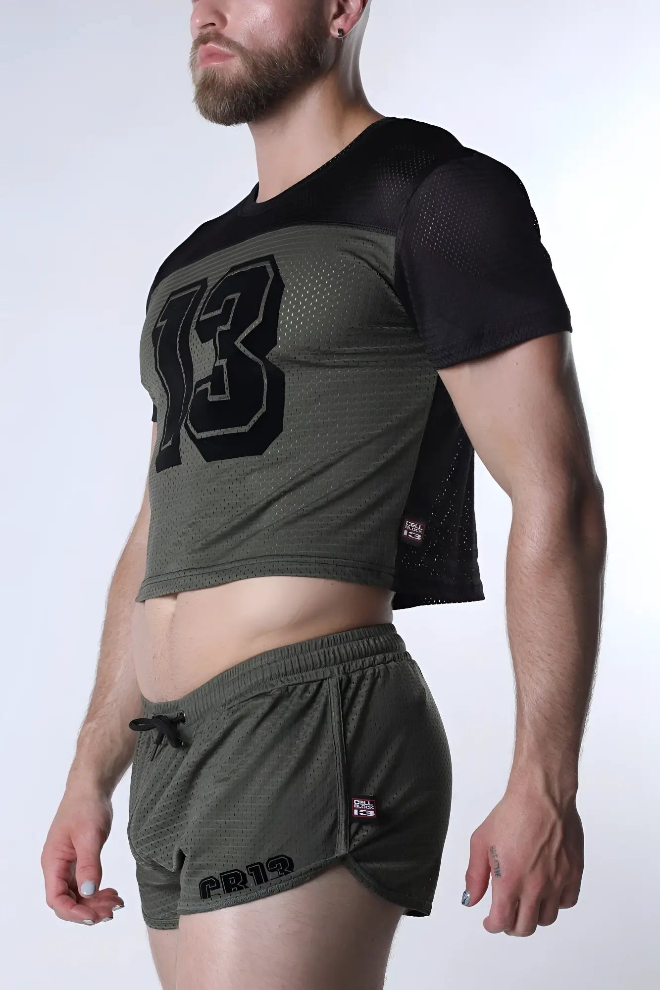 Olive green starter mesh crop top with black number 13 and side panels paired with matching shorts