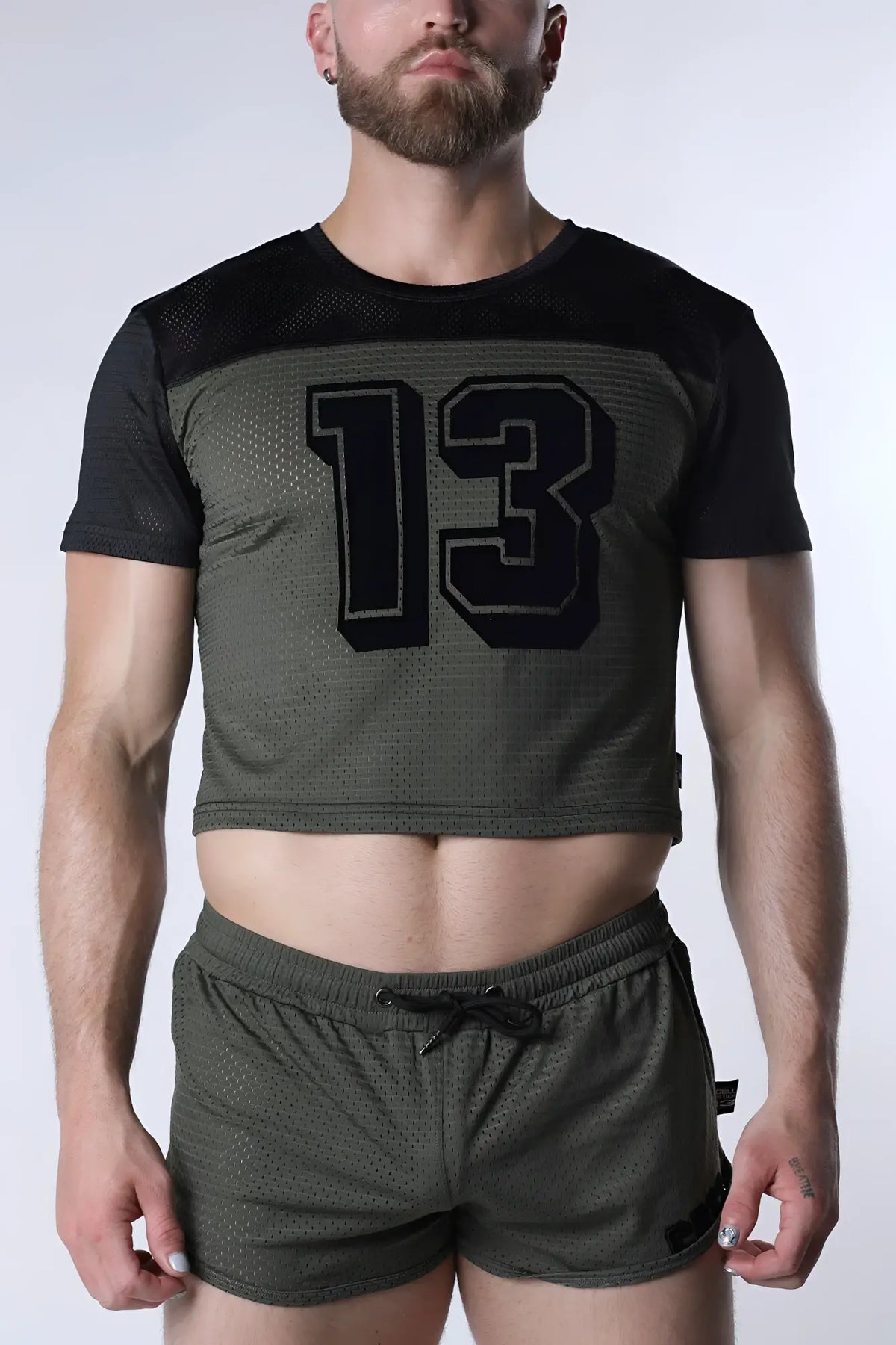 Starter mesh crop top in olive green with black short sleeves and a bold 13 graphic on the chest