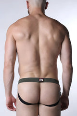 Starter mesh jockstrap briefs in olive green textured fabric with black elastic straps and a red logo tag