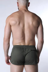 Olive green starter mesh shorts with textured fabric and black side pocket for athletic use