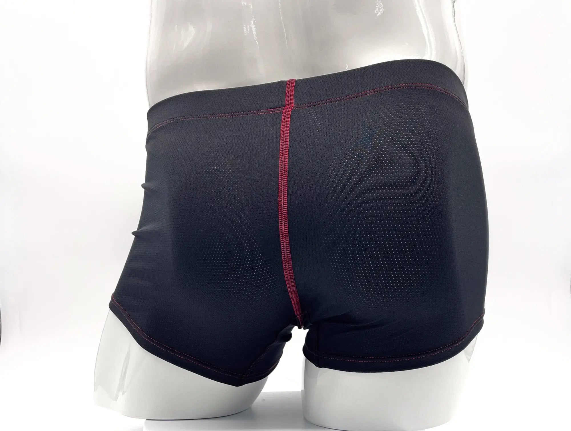 Black stitch big boy pouch boxer brief with red central seam and mesh texture for athletic use