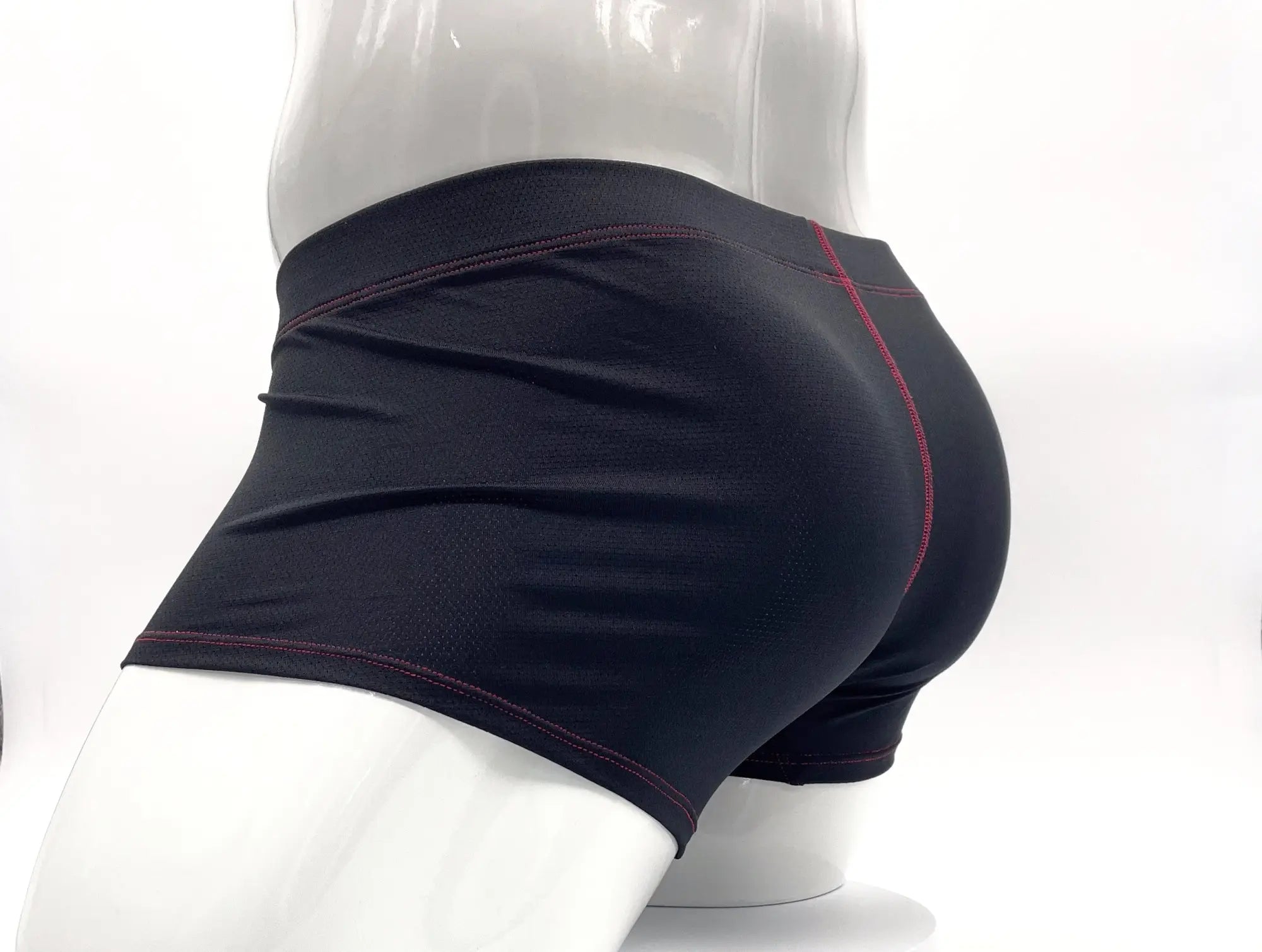 Black athletic boxer brief with big boy pouch and subtle red stitching for comfortable active wear