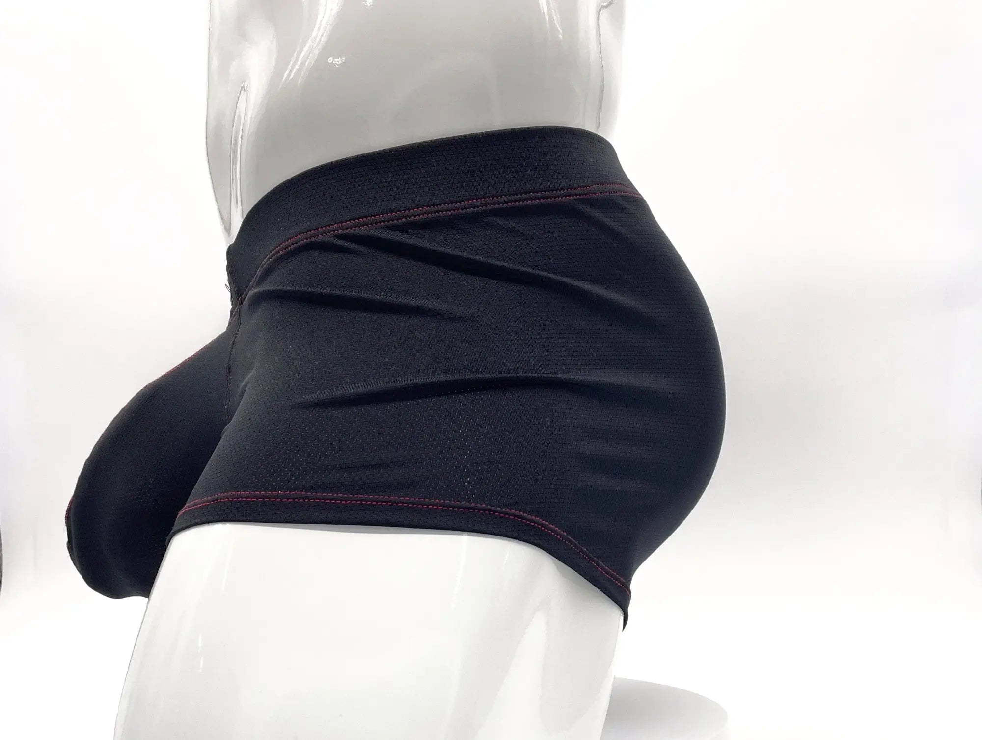 Black stitch big boy pouch boxer brief with snug fit and contrasting red stitching along the waistband