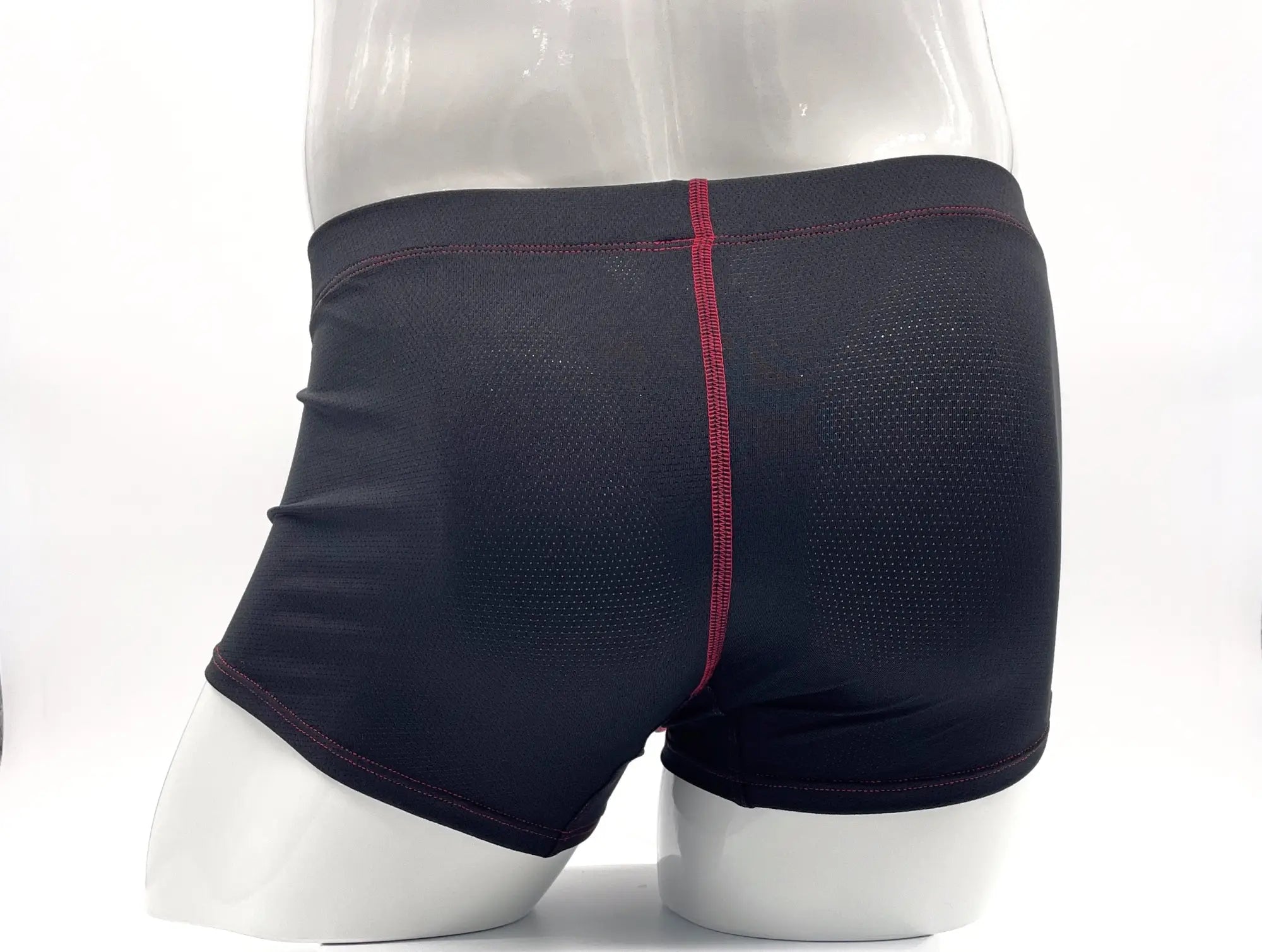 Black mesh Stitch big boy pouch boxer brief with red stitching along center seam and waistband for comfortable support
