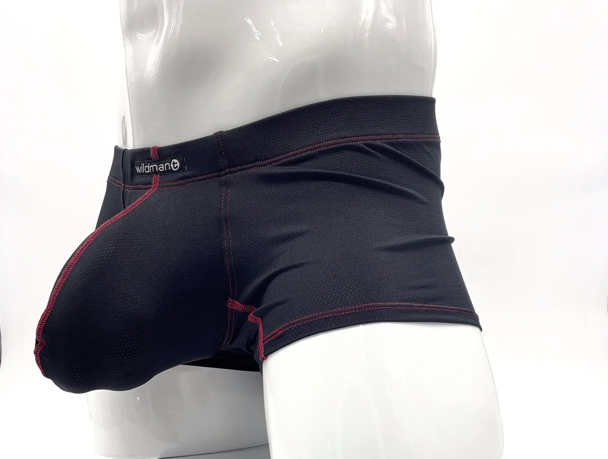 Black wildman stitch big boy pouch boxer brief in black with red stitching along seams and waistband in front view