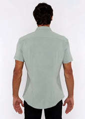 A light green stretch knit shirt for men with short sleeves and tailored fit featuring subtle stitching details