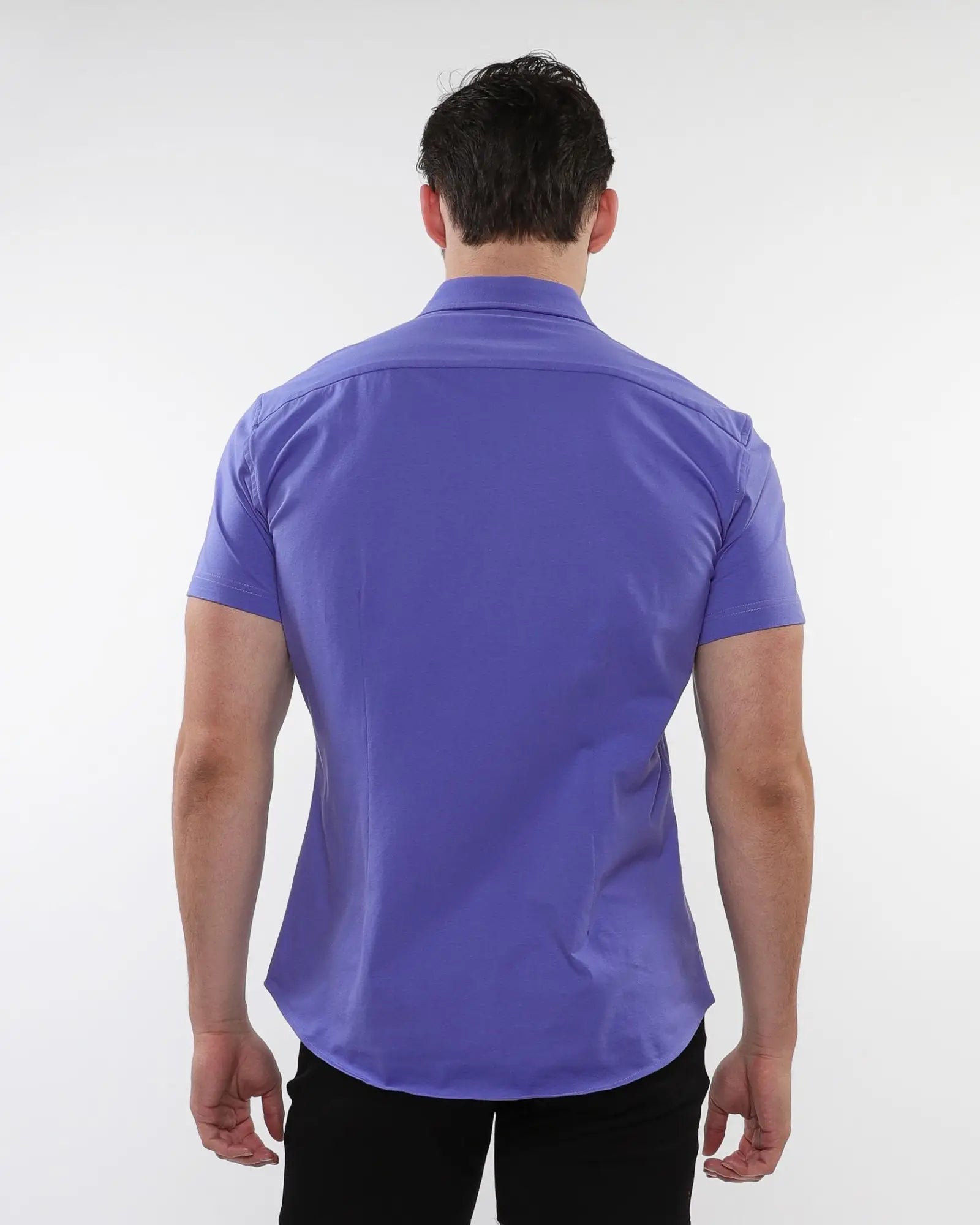 A tailored fit purple stretch knit shirt with short sleeves and a crisp collar for a sleek look