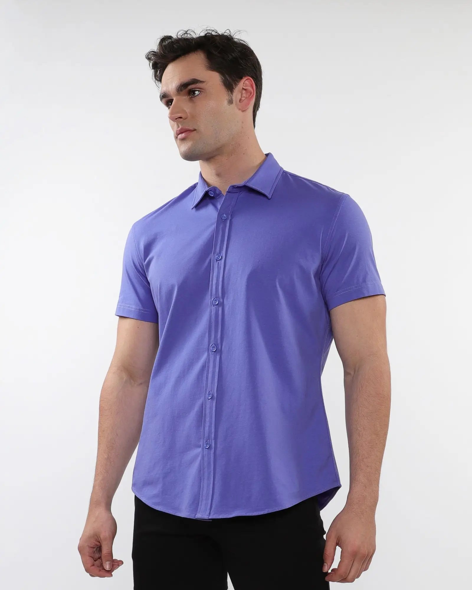A sleek solid purple stretch knit short-sleeved dress shirt with a classic collar and button-down front