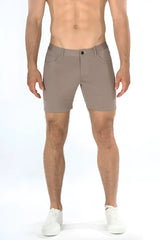 Beige stretch knit shorts with sleek modern design and subtle stitching details for comfortable wear