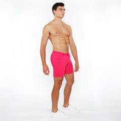 Bright pink stretch knit short with tailored fit and belt loops designed for athletic wear and comfort