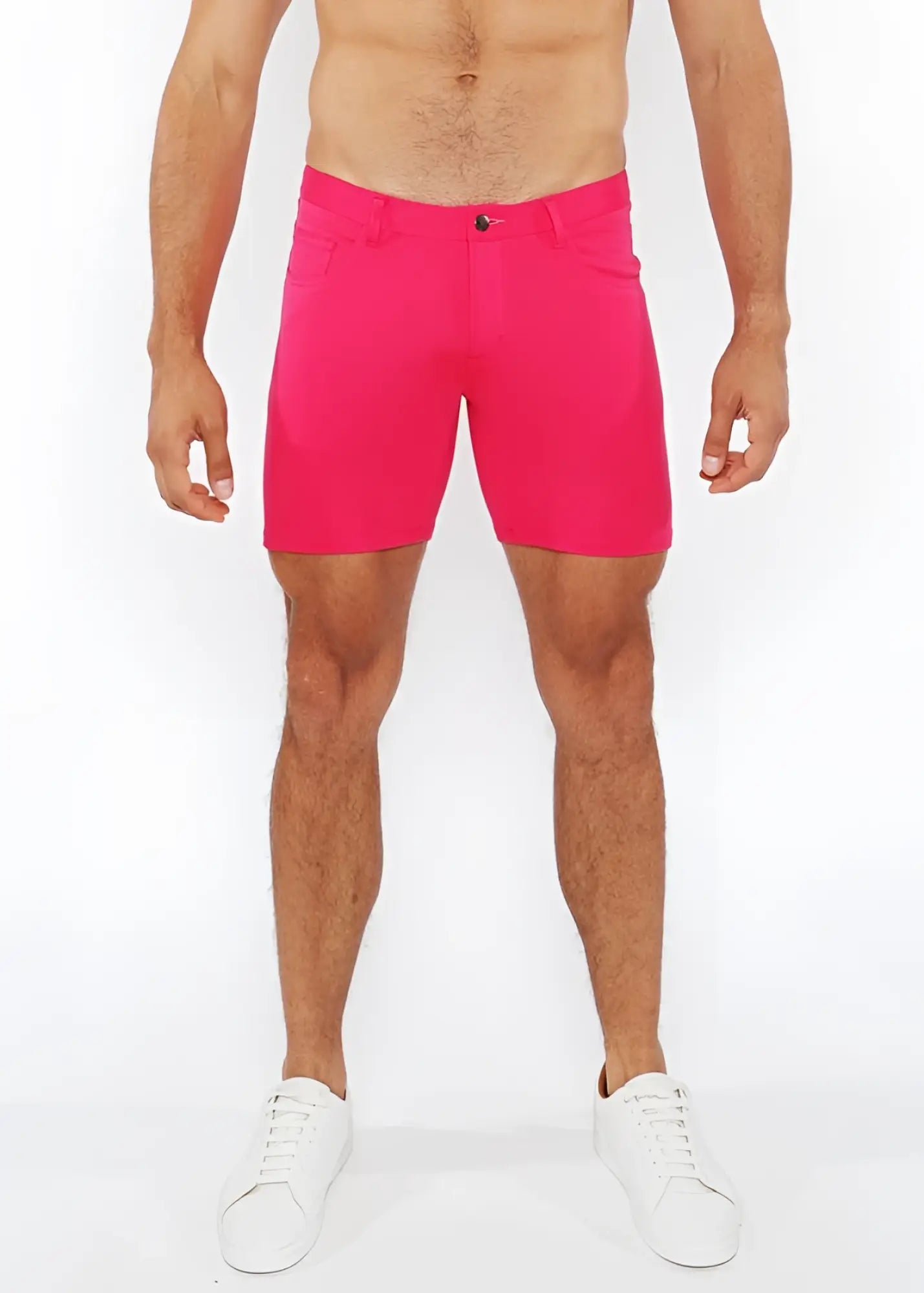 Bright pink stretch knit shorts for men with a clean tailored fit and single button closure