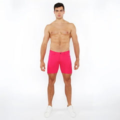 Bright pink stretch knit shorts with classic five-pocket design and button closure for comfortable wear