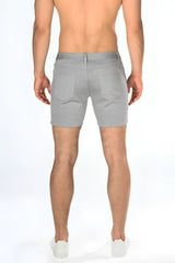 Gray stretch knit shorts with tailored fit and two back pockets shown from the back side