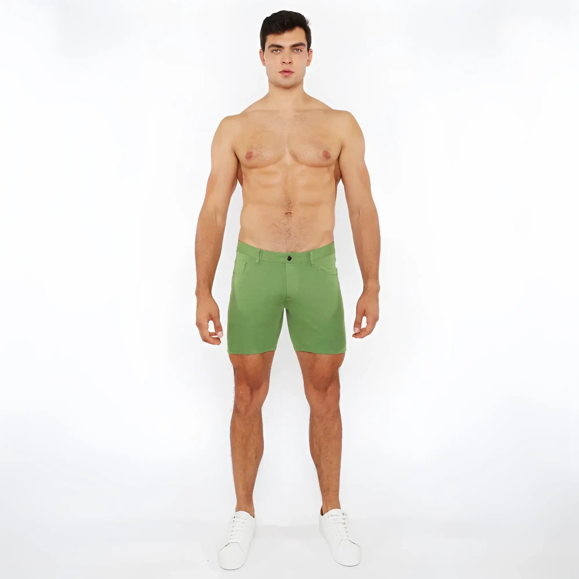 Green stretch knit shorts with a clean tailored fit and subtle stitching details for comfortable wear