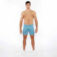 A pair of light blue stretch knit shorts with a form-fitting modern design for active wear