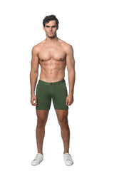 Stretch knit short in olive green slim-fit with classic button closure and subtle side pockets in stretch fabric