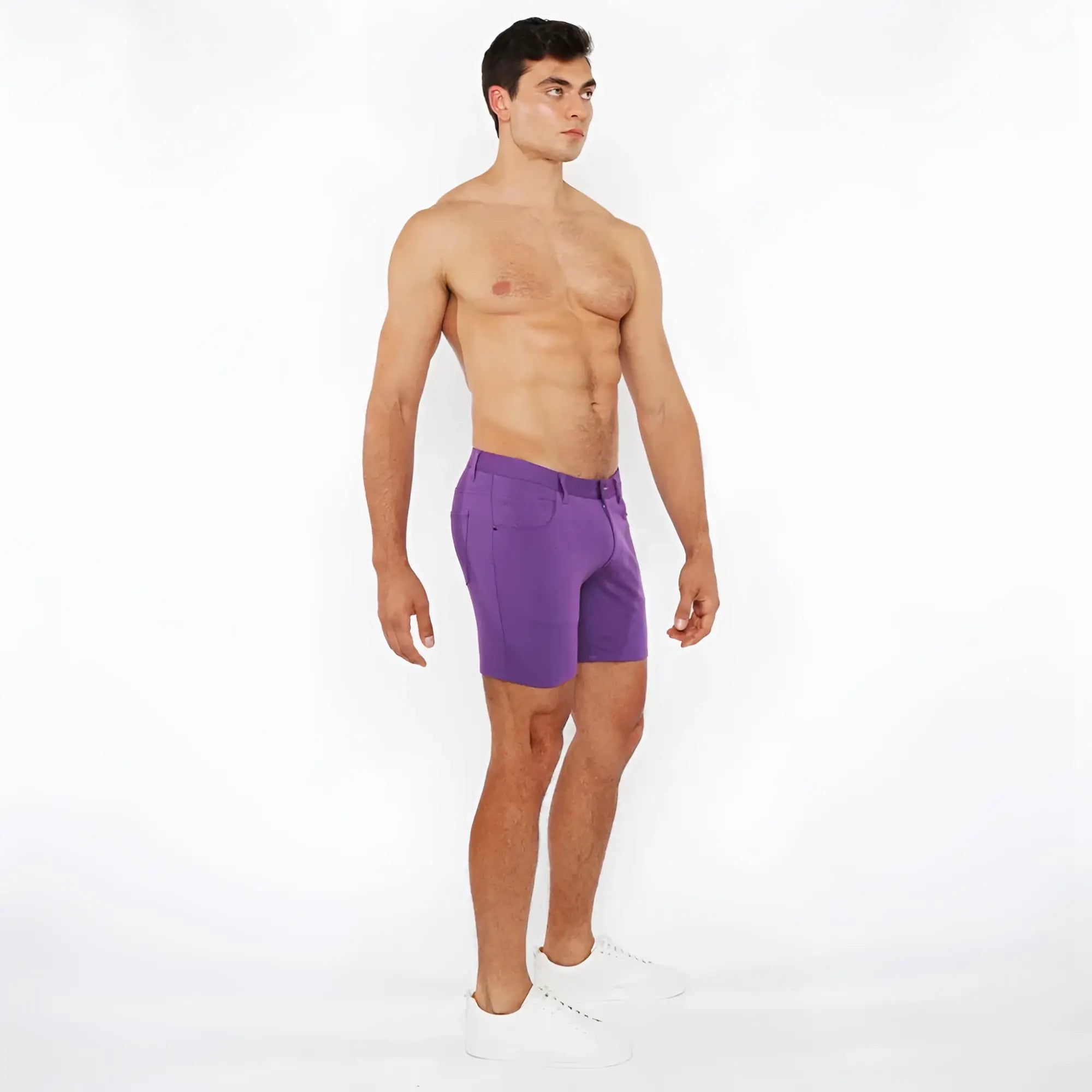 Purple stretch knit athletic shorts with tailored fit and subtle side pockets for comfortable activewear