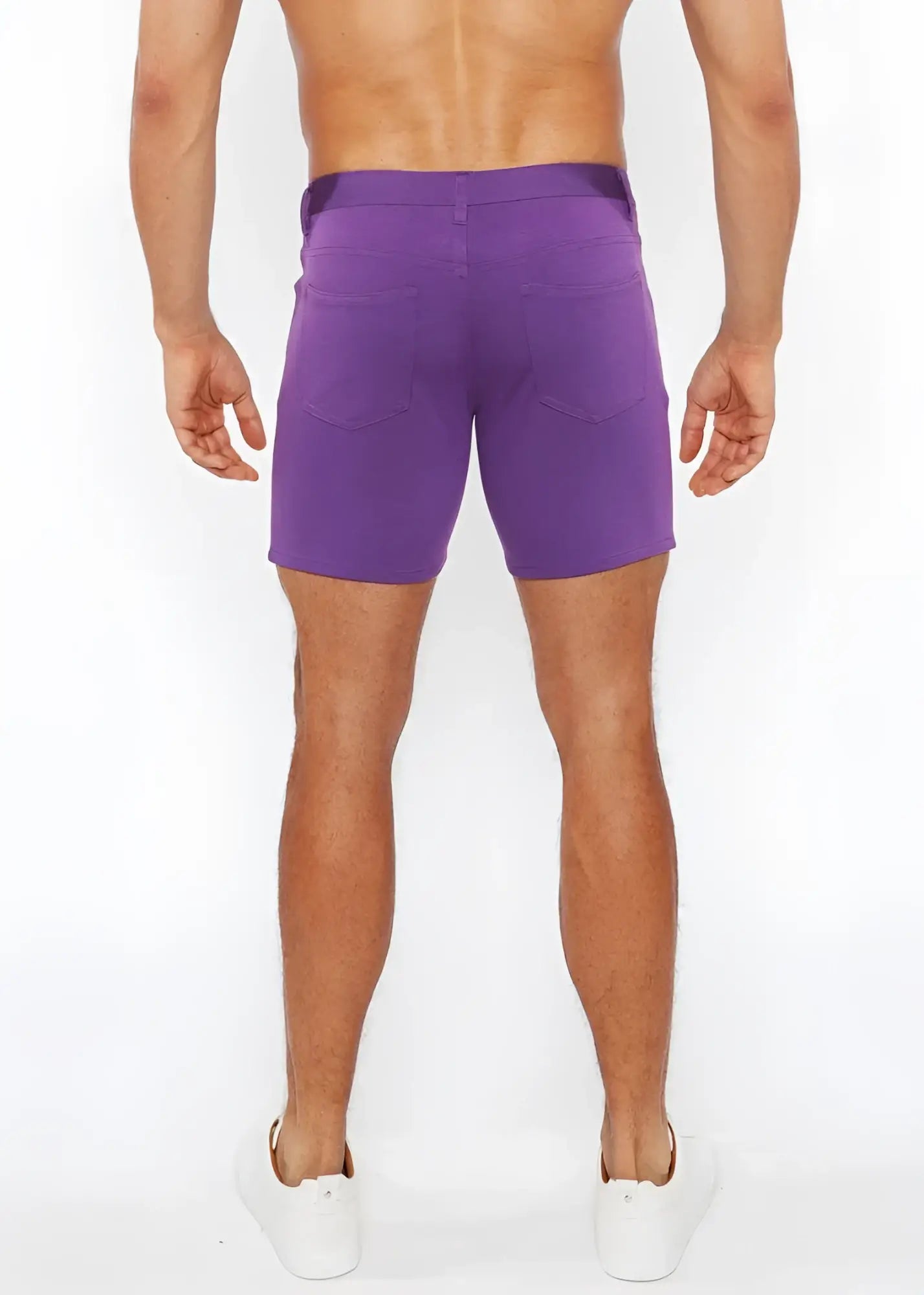 Back view of purple stretch knit shorts with a straight-leg cut and two back pockets for casual wear