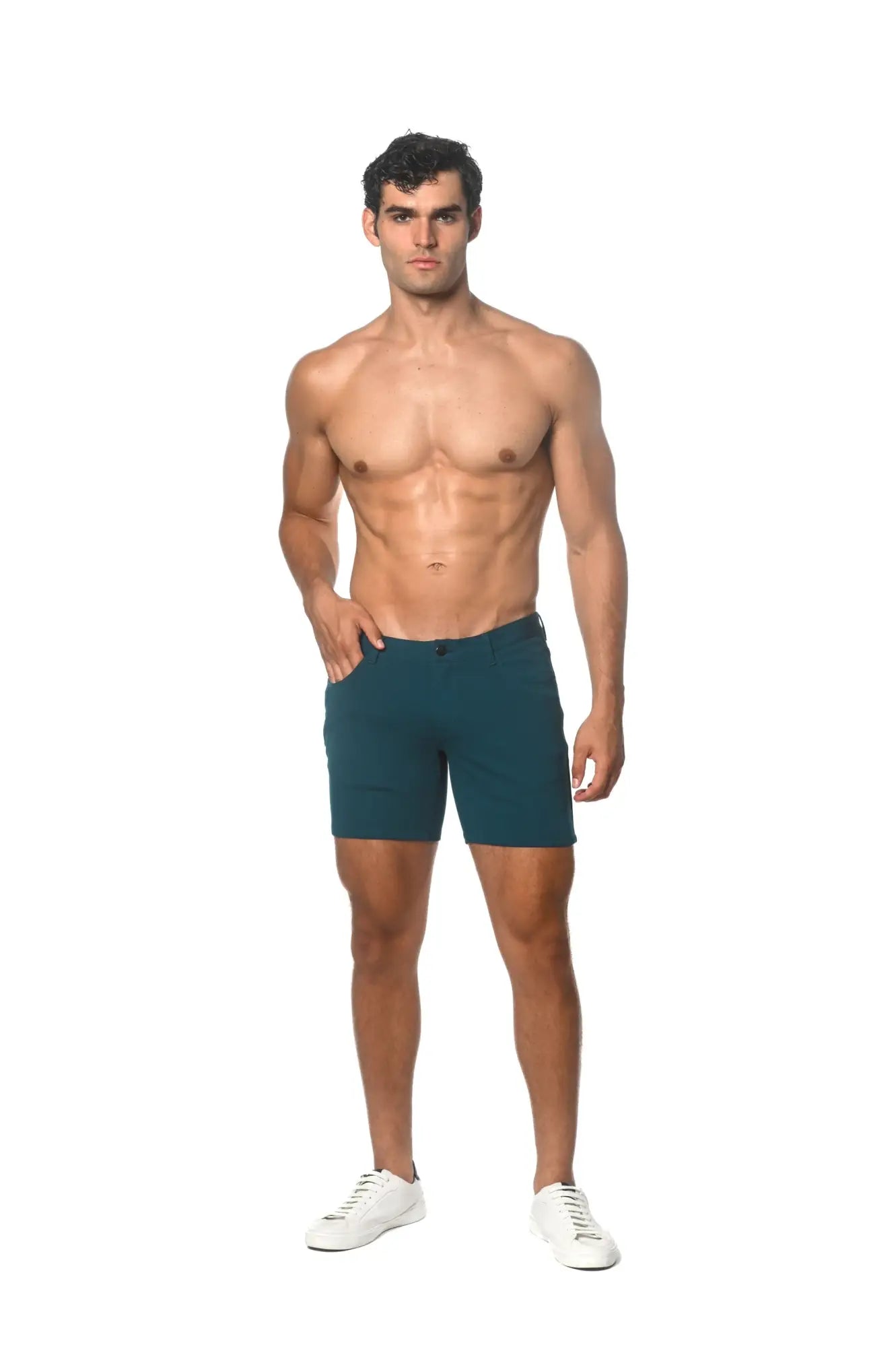 Teal stretch knit short with a form-fitting design and subtle stitching detail for comfortable wear