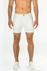 White stretch knit shorts with sleek modern design and subtle stitching details for athletic use