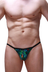 String ficelle chely tropical thong with vibrant tropical leaf pattern black elastic waistband and small red logo on front
