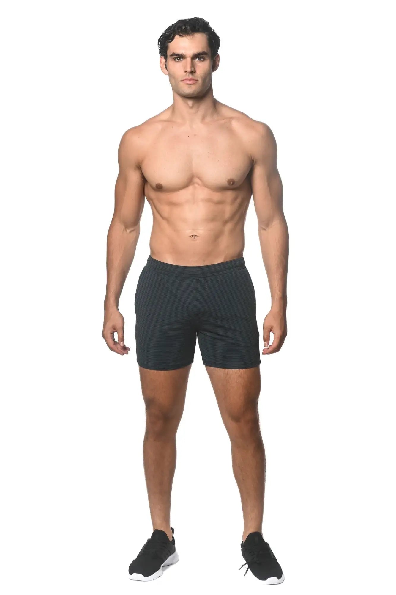 Black stripe stretch performance shorts with a subtle textured pattern and elastic waistband for athletic use