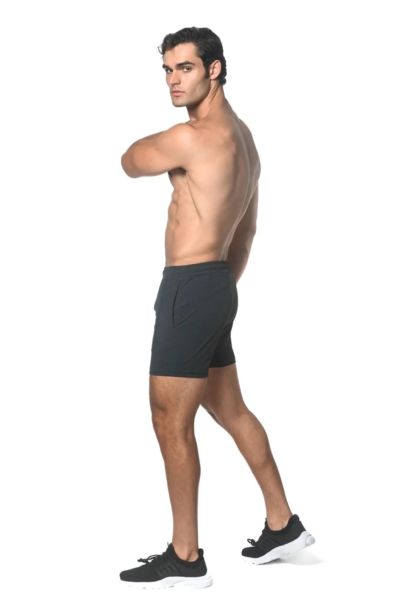 Dark gray textured stripe stretch performance athletic shorts with side pockets and a fitted cut for active wear