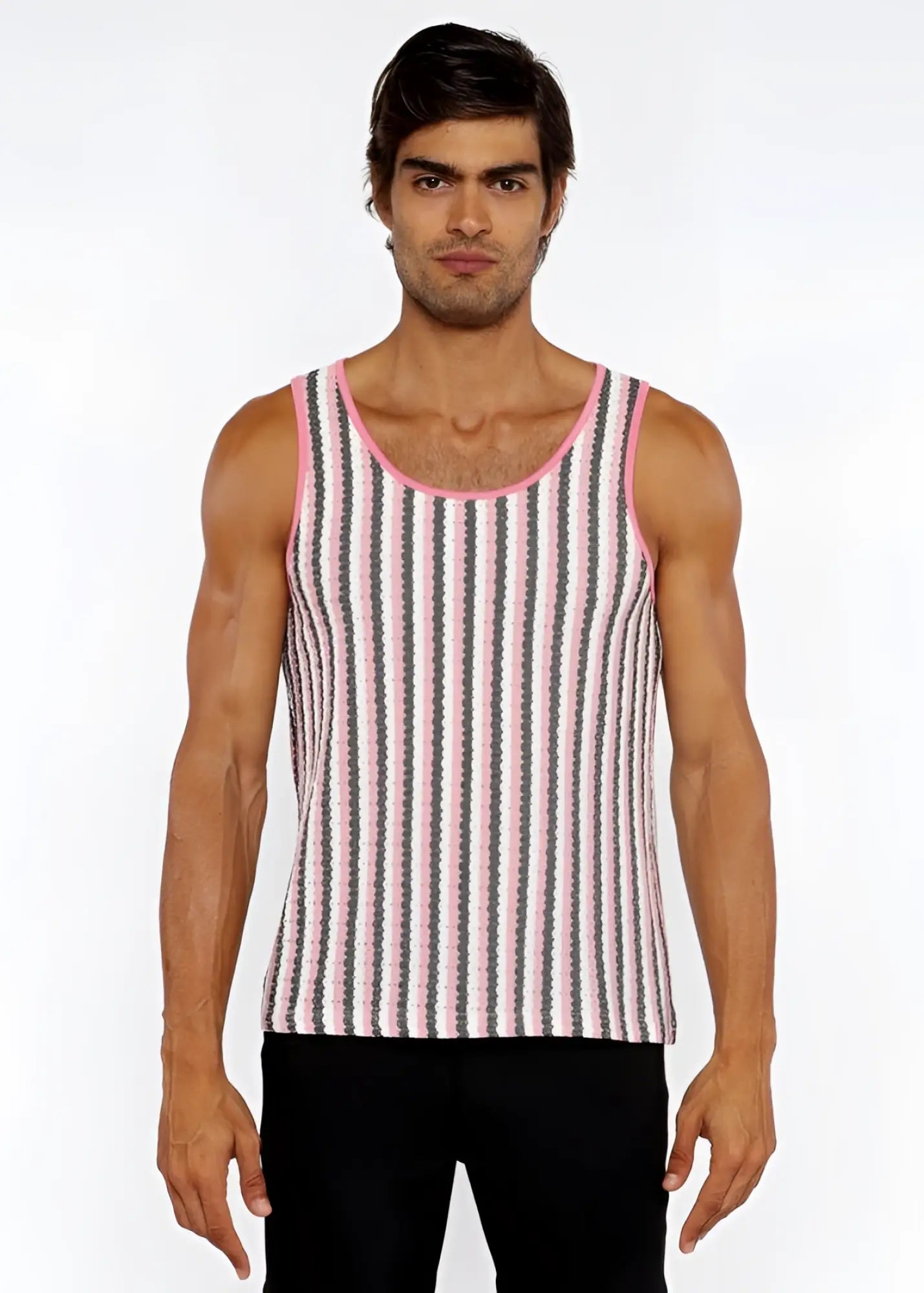 A man wearing a pink and gray striped open knit tank top with matching pink trim around the neckline