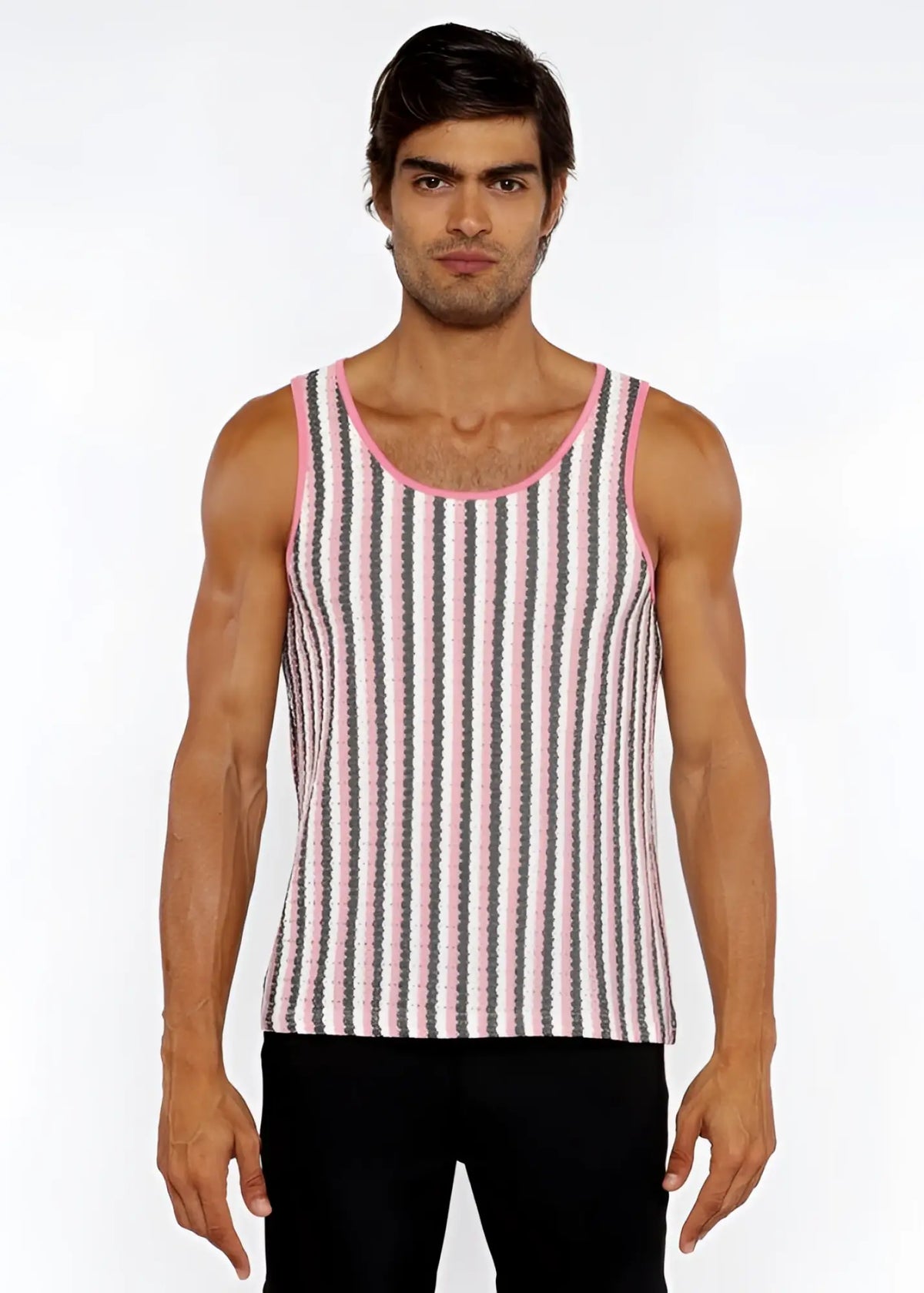 A man wearing a pink and gray striped open knit tank top with matching pink trim around the neckline