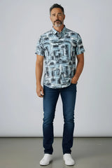 A man wearing a suslo crinkled fabric s/s shirt with an abstract gray and white geometric pattern