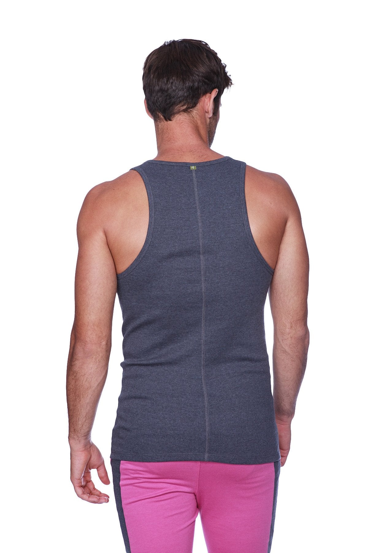 Back view of a dark gray heathered sustain tank charcoal with a central zipper made from soft breathable fabric