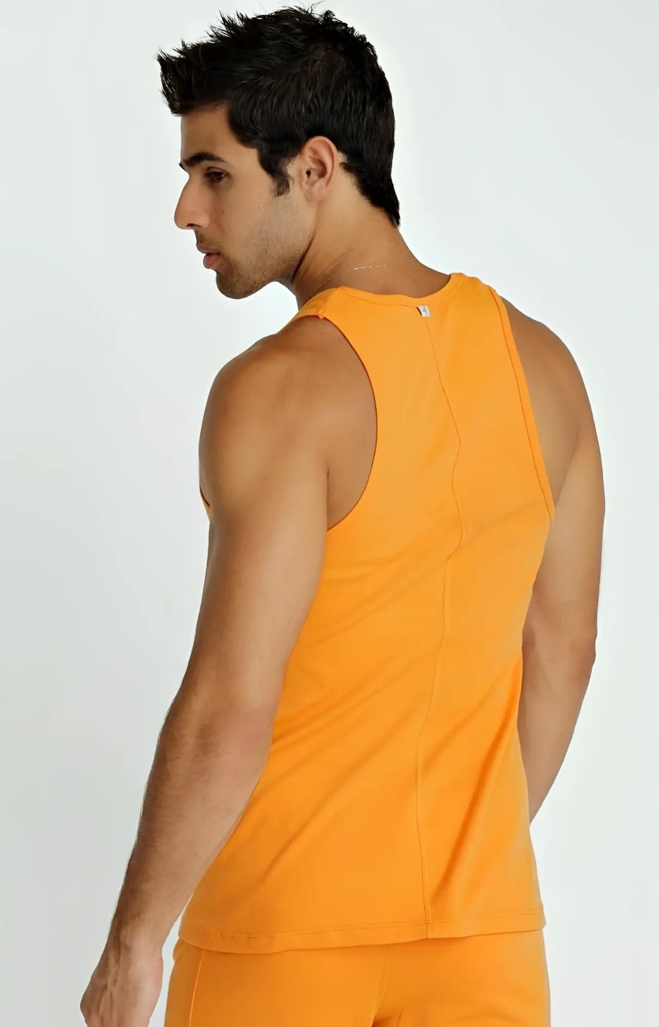 Orange sleeveless athletic tank top sustain tank sun orange made from sustainable fabric for active wear
