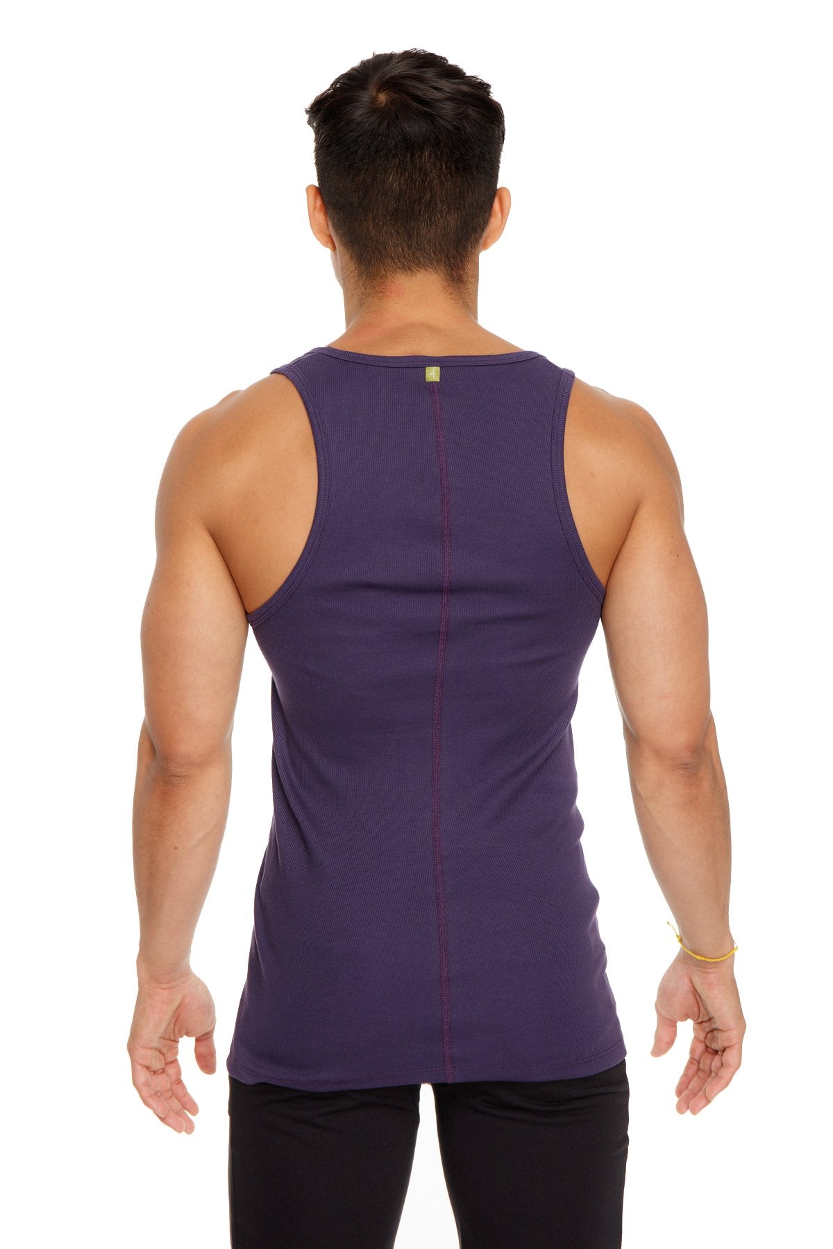 Sustain tank top in eggplant purple with a sleeveless design central seam and subtle stitching detail