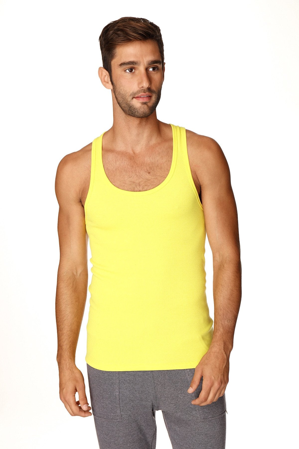 Bright yellow sleeveless sustain tank top with a simple fitted design perfect for casual and active wear