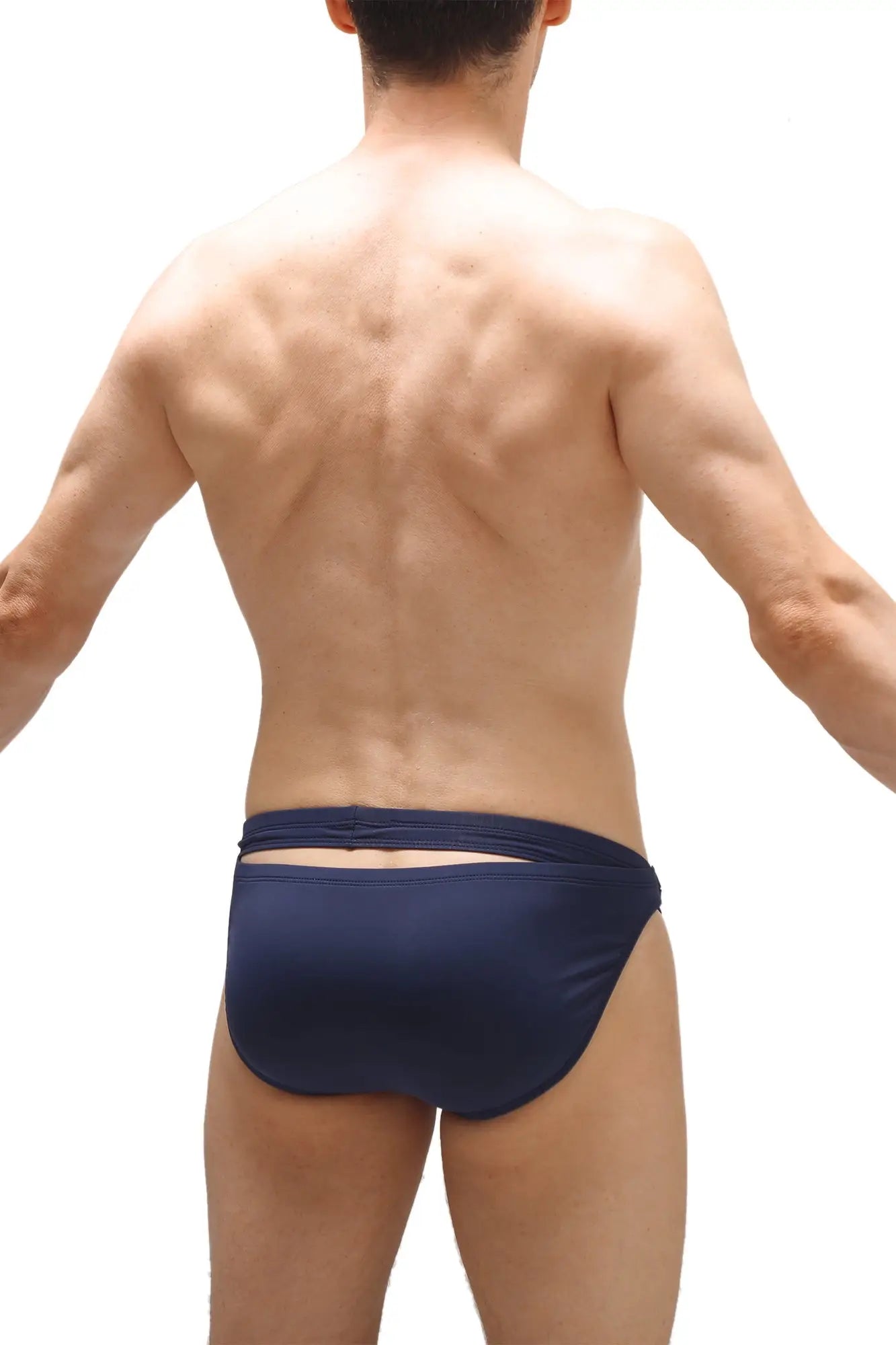 Navy blue recycled swim bikini griede swim trunks showing back cutout detail for sustainable swimwear use