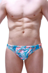 Swim bikini taik boucan vibrant blue and pink tropical leaf patterned swim trunks with tied waistband
