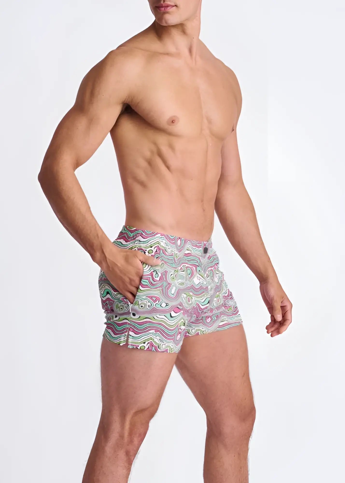 Men’s swim trunks with vibrant pink green and white swirls print seersucker fabric and mesh lining