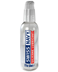 Clear glass bottle with silver pump dispenser labeled swiss navy silicone lubricant in blue and red text