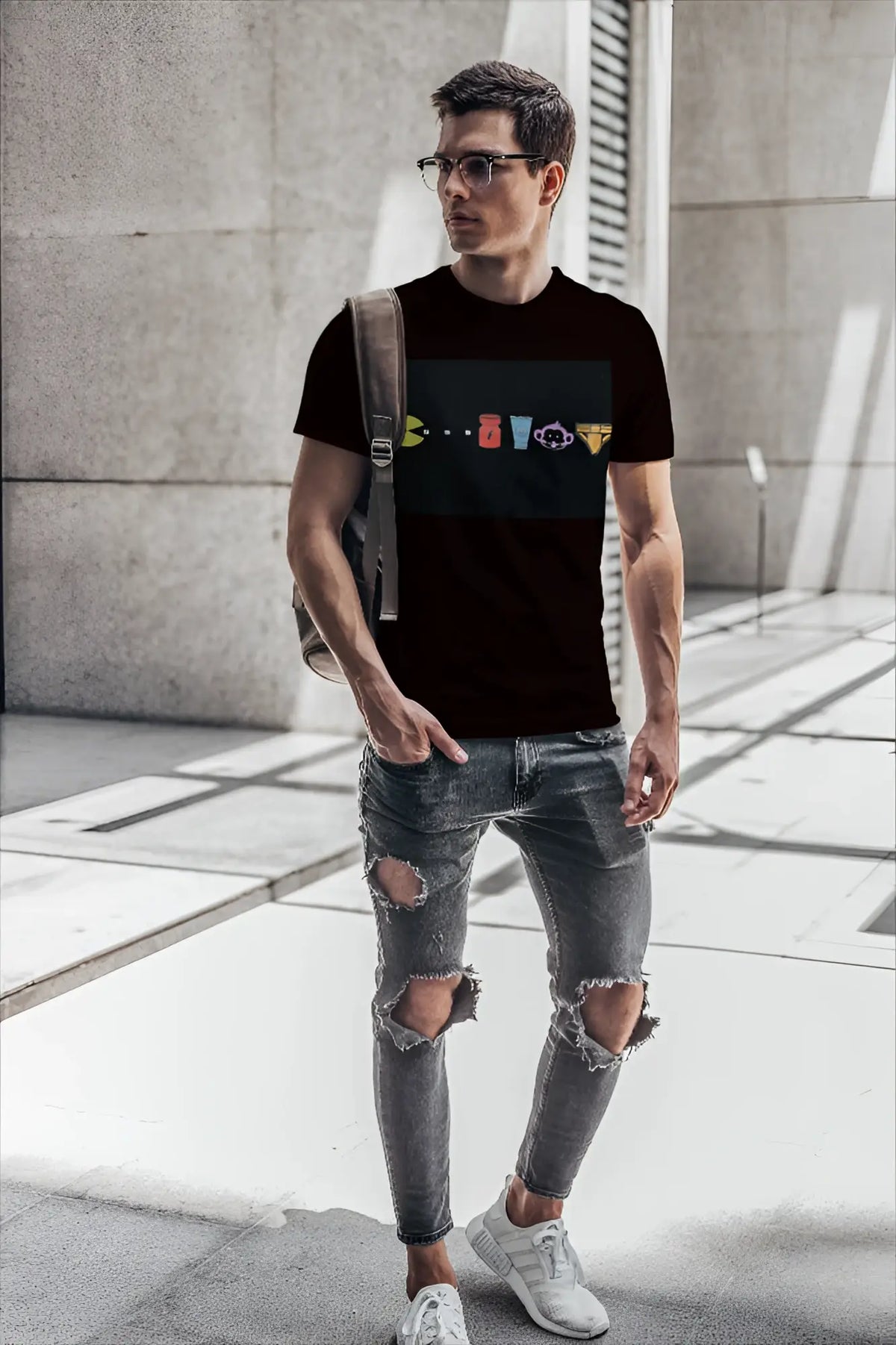 Black short-sleeved cotton t-shirt by t-shirt monkey with colorful classic video game character graphics