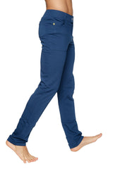 Navy blue tactical urban at home dress pant with slim fit textured fabric and gold-tone brand patch on back pocket