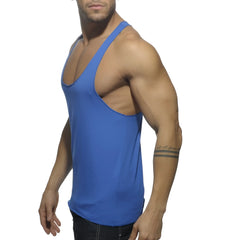 A vibrant royal blue muscle tank top with deep scoop neckline racerback design shown from the back side