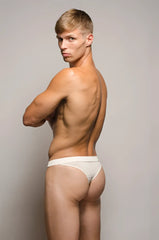 White tartarus buckle thong underwear with a sleek buckle detail designed for comfortable everyday wear