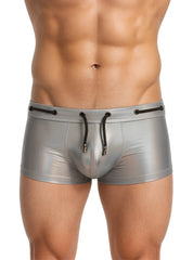 Shiny silver metallic swim trunks with black drawstrings in the tartarus side track metallic trunk design