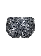Black tartarus swim brief with delicate white and gray rose floral pattern designed for swimming and beachwear