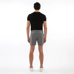 Textured jacquard stretch chino shorts in gray with a subtle woven pattern and black button details
