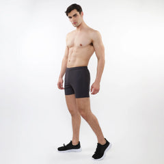 Black textured mesh stretch performance shorts with a sleek form-fitting design for athletic use